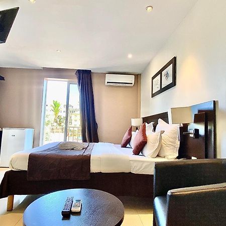 קונאקרי Hotel M'Lys מראה חיצוני תמונה