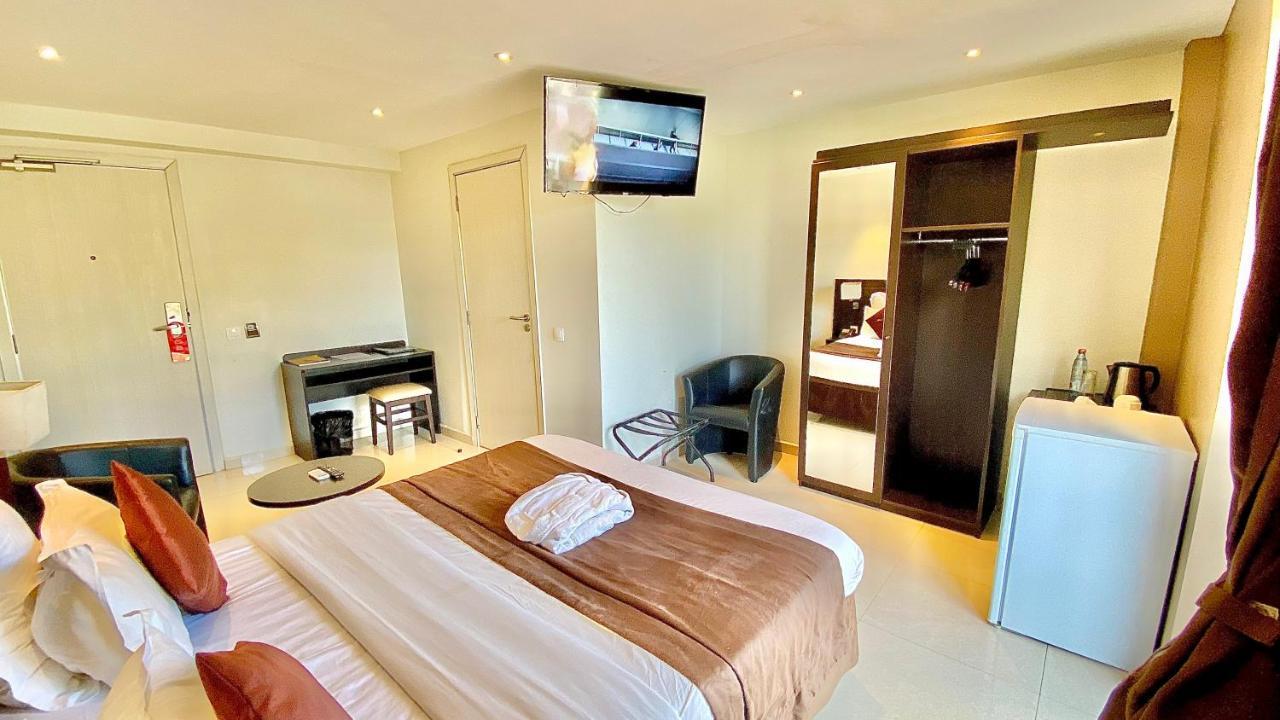קונאקרי Hotel M'Lys מראה חיצוני תמונה